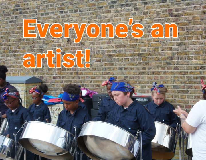 Young people playing steel pans outside